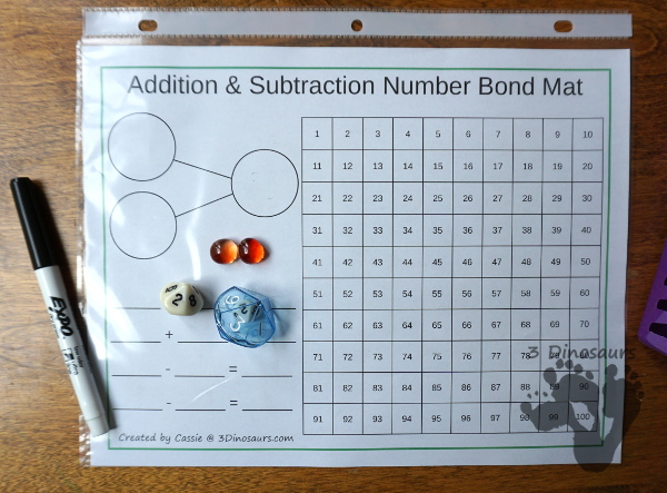 Free Addition & Subtraction Number Bond Mats with 100 Chart - with several color options and has math facts, number bonds and 100 chart for kids to use - 3Dinosaurs.com