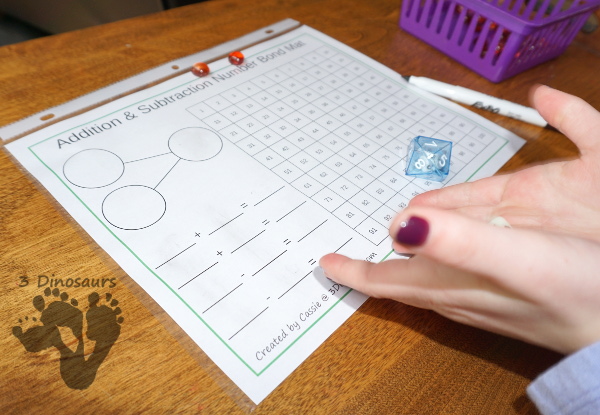 Free Addition & Subtraction Number Bond Mats with 100 Chart - with several color options and has math facts, number bonds and 100 chart for kids to use - 3Dinosaurs.com