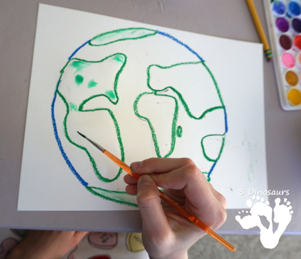 Watercolor Planet Earth Process Art - An easy and fun art project for planet Earth using watercolors and oil pastels - 3Dinosaurs.com