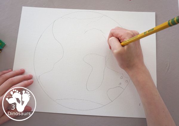 Oil Pastel Earth with Heart Shapes - a great craft that works on blending colors and making a very fun planet Earth for Earth Day - 3Dinosaurs.com