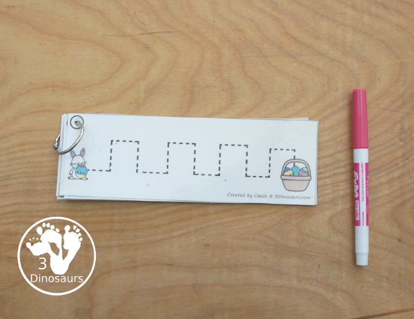 Free Easter Prewriting Strips - prewriting printable for kids working on more complex prewriting skills with prewriting fonts in repeat pattern and sizes. You have Easter Bunny getting to a basket of eggs. - 3Dinosaurs.com