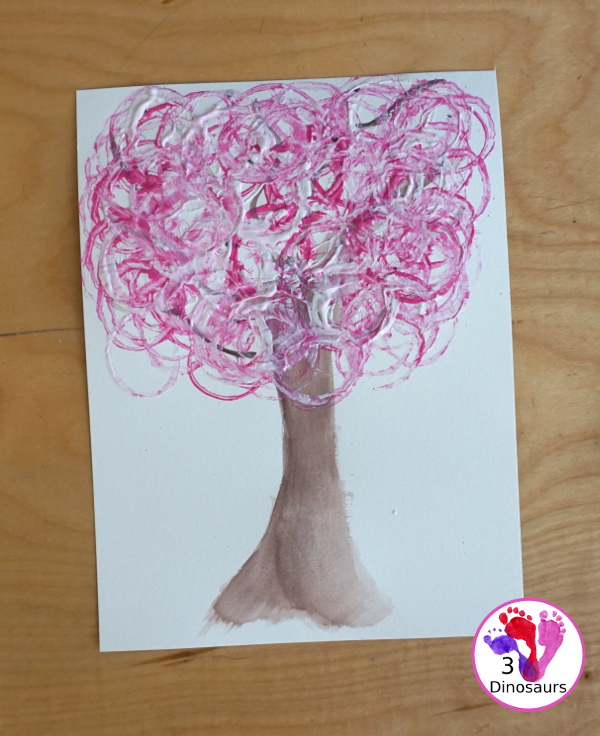 Paper Roll Painted Spring Tree is a fun spring painting with watercolor trunk and paper roll painted pink and white tree. Super easy for kids to do - 3Dinosaurs.com