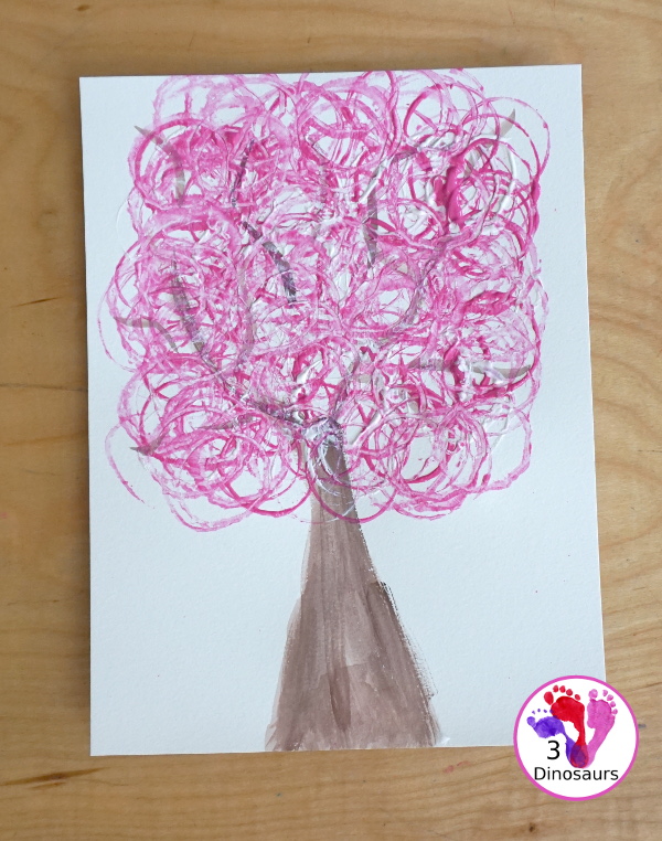 Paper Roll Painted Spring Tree is a fun spring painting with watercolor trunk and paper roll painted pink and white tree. Super easy for kids to do - 3Dinosaurs.com