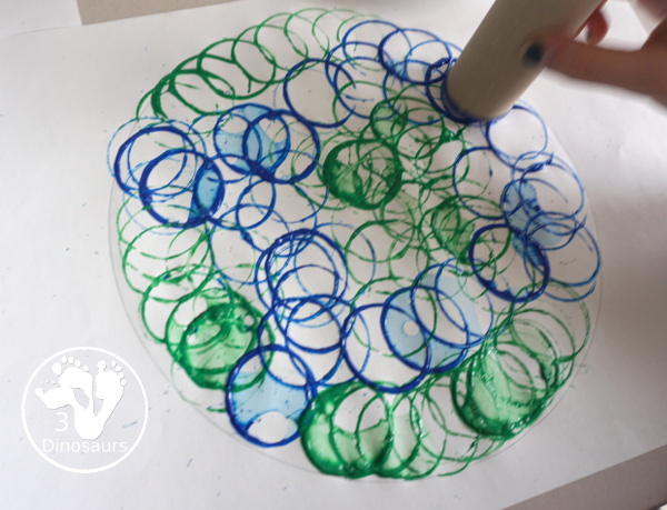 Paper Roll Painted Earth for Earth Day - fun process art projects that kids can do with paper rolls - 3Dinosaurs.com