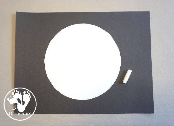 Total Solar Eclipse Pastel Craft - made with a black construction paper and a white chalk pastel - 3Dinosaurs.com