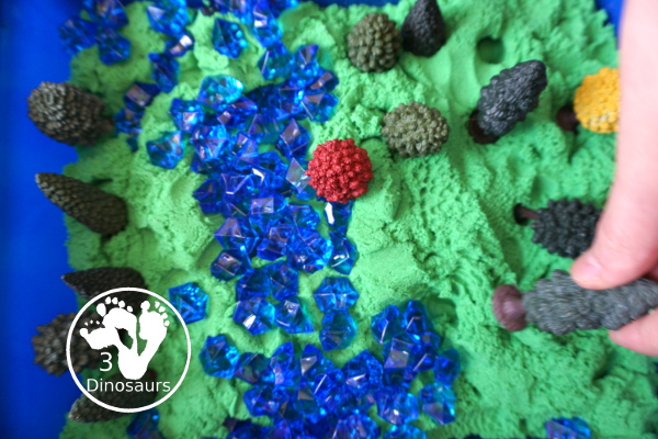 Tree & Kinetic Sand Sensory Bin for Arbor day and Earth Day - make a stream and trees with the sensory bin - 3Dinosaurs.com