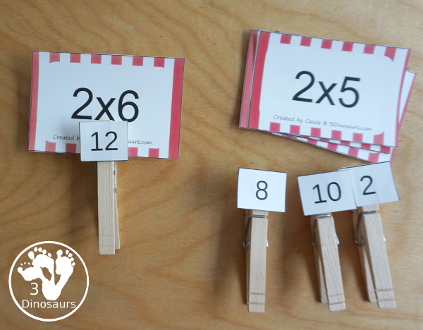 Free Multiplication Flash Cards Printables - with multiplication from 1 to 12 with white, red, green, pink and blue options for the cards with 8 cards on each page - clipping the answer to the flashcards - 3Dinosaurs.com
