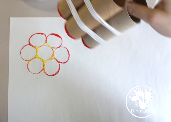 Paper Roll Flower Painting - a simple flower garden craft using paper, paints and paper rolls - - painting the flowers - 3Dinosaurs.com