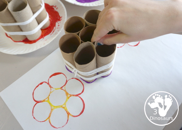 Paper Roll Flower Painting - a simple flower garden craft using paper, paints and paper rolls - painting the flowers - 3Dinosaurs.com
