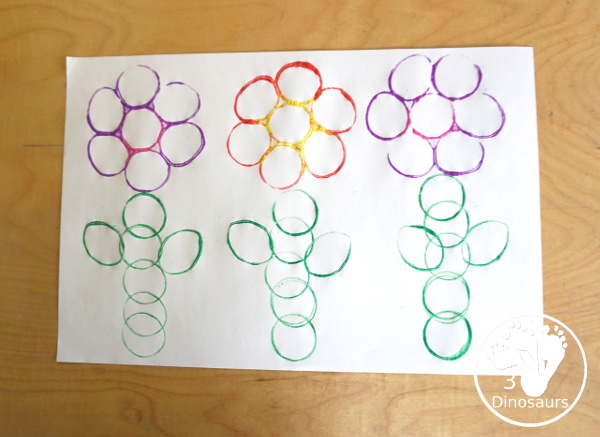 Paper Roll Flower Painting - a simple flower garden craft using paper, paints and paper rolls - see how we made this simple flower painting craft for kids. - 3Dinosaurs.com