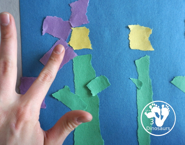 Torn Paper Flowers - a fun torn paper craft that kids can do with glue and construction paper. A simple flower craft for kids in preschool and prek. 3Dinosaurs.com