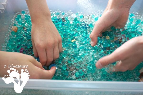 Rock & Water Bead Sensory Bin - a great hands-on play with rocks and sensory bins for kids of all ages - 3Dinosaurs.com #sensorybin #sensoryplay