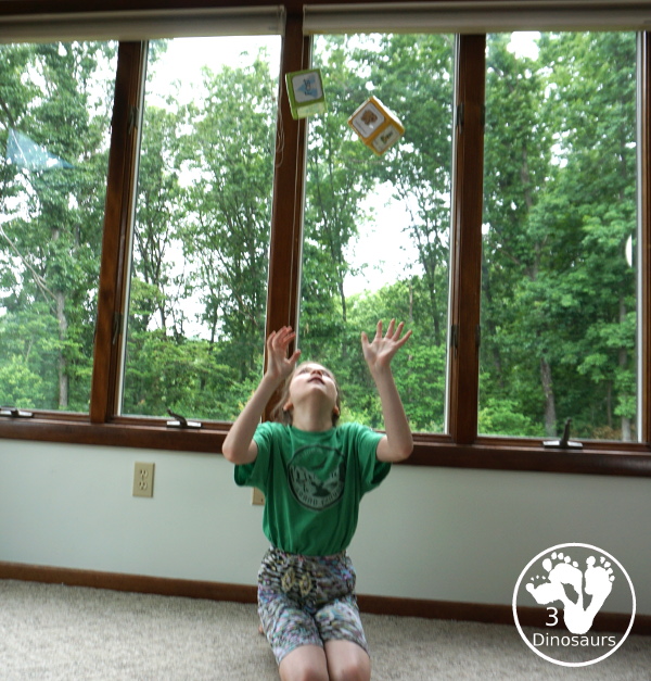 Free Camping Theme Gross motor Dice - it has 6 movements for kids to do and loads of fun - 3Dinosaurs.com