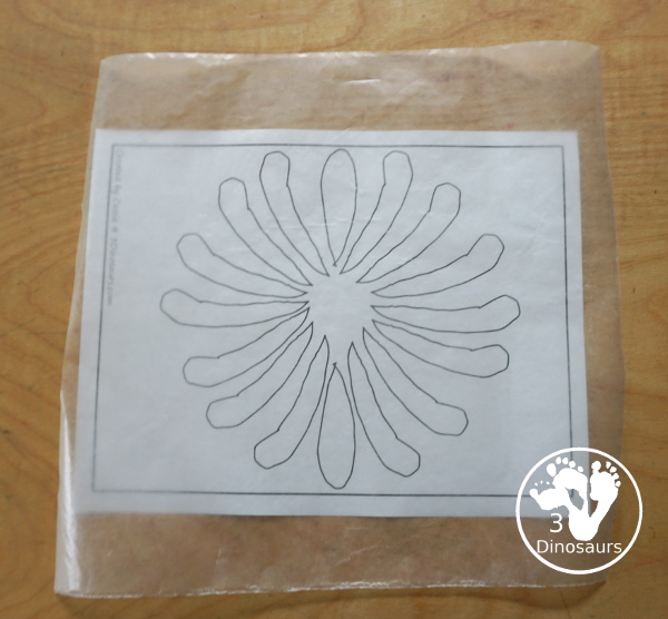 Tissue Paper Firework Craft for Kids - A fun window display for a fireworks craft that you can do for the fourth of July, New Years Eve or any holiday with fireworks. It works great for prek, kindergarten, first grade, and older. - 3Dinosaurs.com