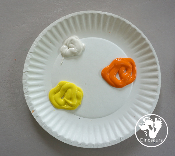 Firework Painting with String Balls - with a simple rubber band string ball painting with different colors and great for the Fourth of July and any Firework themes. And also works for the Opening Ceremony for the Olympics