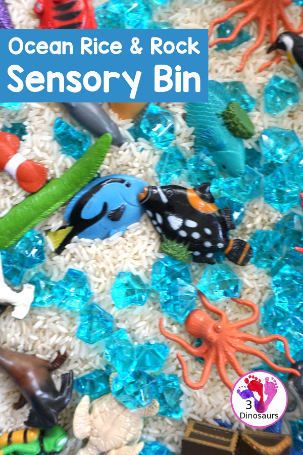 Ocean Rice and Rock Sensory Bin - a simple rice base sensory bin that has ocean animals and blue acrylic rocks in the bin. A simple sensory bin for any ocean theme - 3Dinosaurs.com
