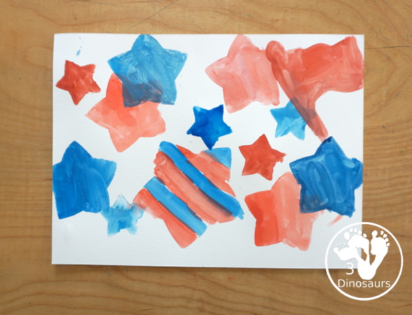 Stars & Flag Watercolor Painting with Cookie Cutters - a simple painting activity that you can do with kids with red and blue colors painting inside stars and flags.- 3Dinosaurs.com