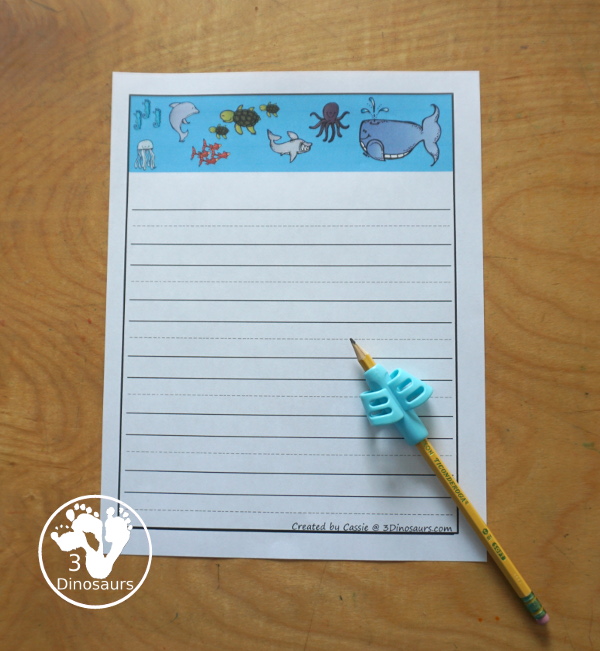 Free Ocean Writing Paper - you have four pages of writing paper with guidelines and single page lines. You have a space for drawing and lines or just a page with lines for kids to have fun writing. 3Dinosaurs.com