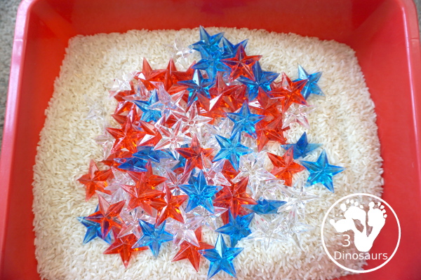 Red, White & Blue Star Sensory Bin for the Fourth of July - A simple sensory bin with red, white and blue stars with a rice filler. A great way to work on color for the 4th of July with kids in preschool, prek and kindergarten - 3Dinosaurs.com