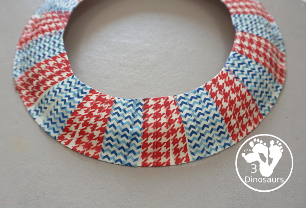 Red, White, and Blue Washi Tape Wreath - a simple paper plate wreath made with washi tape with colors for the Fourth of July. 3Dinosaurs.com