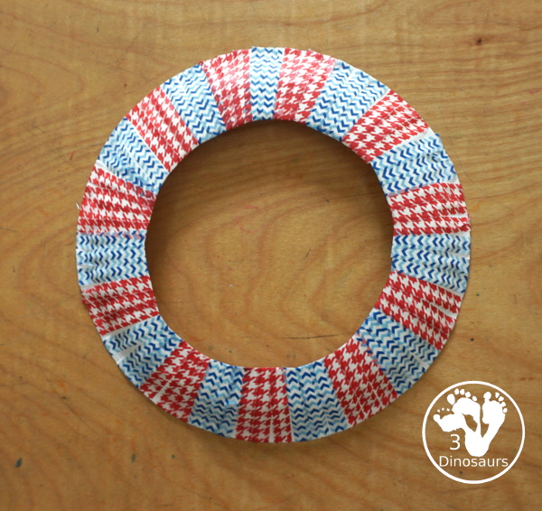 Red, White, and Blue Washi Tape Wreath - a simple paper plate wreath made with washi tape with colors for the Fourth of July. 3Dinosaurs.com