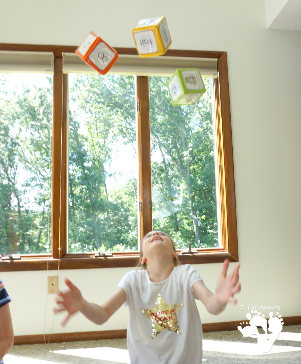 Free Moon Themed Gross Motor Dice -  6 action movements included with dice and dice inserts - 3Dinosaurs.com #space #themoon #grossmotor #freeprintable 