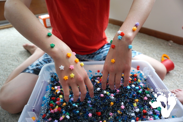 Star Themed Water Bead Sensory Bin - simple to make and play in with loads of space-themed fun for kids  - 3Dinosaurs.com