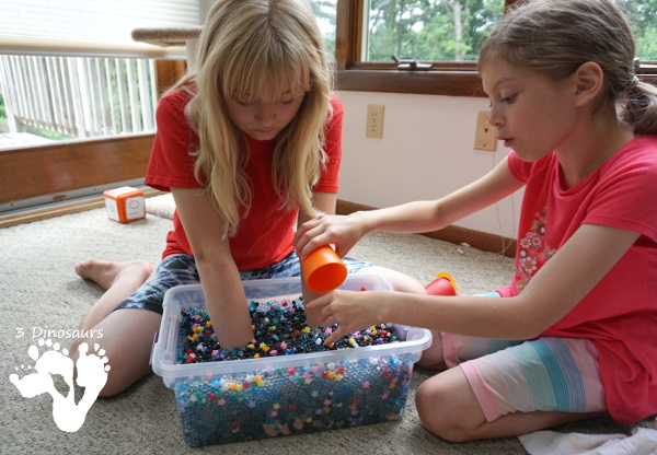 Star Themed Water Bead Sensory Bin - simple to make and play in with loads of space-themed fun for kids  - 3Dinosaurs.com