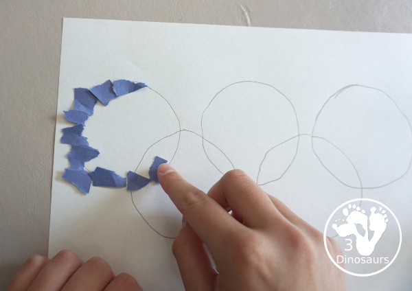 Torn Paper Olympic Rings Craft - is a simple and easy craft that kids can make for the Olympics with torn paper to make the rings. - 3Dinosaurs.com
