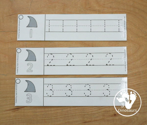 Free Shark Number Tracing Strips - with numbers 0 to 20. You can tracing the numbers and an example of how to trace the numbers on the strips, plus an shark fin on each tracing strip. - 3Dinosaurs.com
