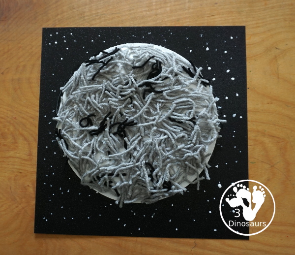 Yarn Moon Craft For Kids is simple to make with a paper plate, glue and yarn to make the moon. It is great for Moon Day or any moon theme you do with kids. - 3Dinosaurs.com