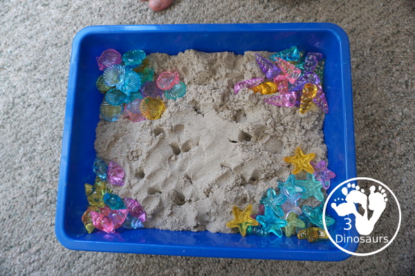 Beach Kinetic Sand & Shell Sensory Bin - for an easy to set up sensory play that kids can do any time of the year and work great for a beach theme day - 3Dinosaurs.com