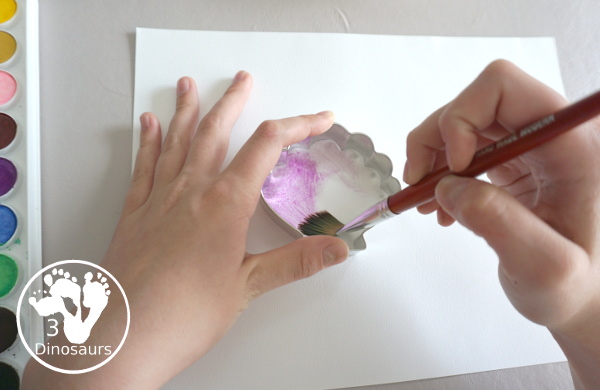 Shell Cookie Cutter Watercolor Painting for a fun beach painting theme for kids. With cookie cutters to make a fun and creative painting of shells - 3Dinosaurs.com
