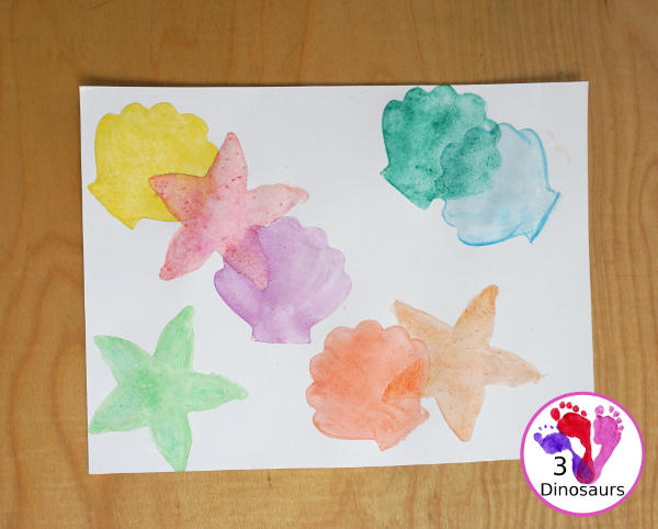 Shell Cookie Cutter Watercolor Painting for a fun beach painting theme for kids. With cookie cutters to make a fun and creative painting of shells - 3Dinosaurs.com