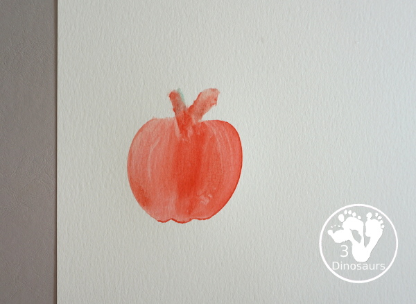 Apple Cookie Cutter Painting - An easy watercolor apple painting activity for various ages can do. With a cookie cutter for the template for the apple - 3Dinosaurs.com