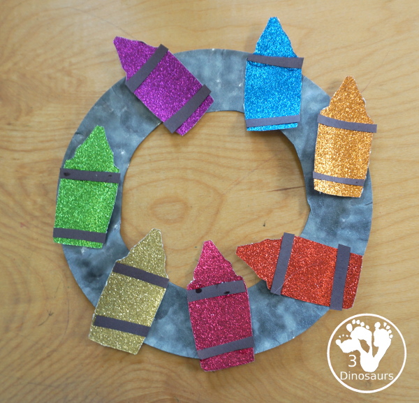Glitter Crayon Wreath Craft For Kids - a great color or back to school glitter crayons wreath you can make with kids. - 3Dinosaurs.com
