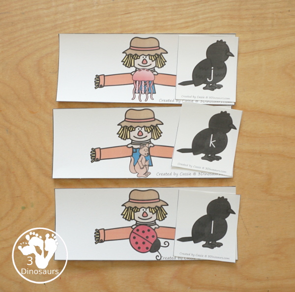 Free Scarecrow ABC Matching Printable -0 matching the beginning sound for each picture on the scarecrow with a crow that has an uppercase and lowercase letter. All 26 letters of the alphabet. - 3Dinosaurs.com