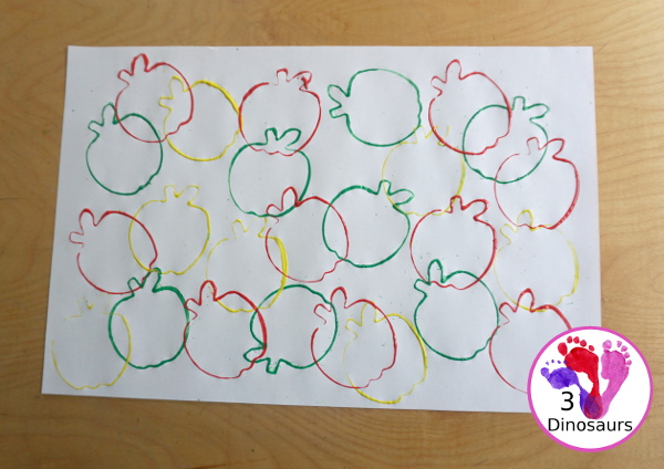 Apple Stamp Painting for Kids - a fun cookie cutter painting idea for apples with red, green and yellow paint - 3Dinosaurs.com