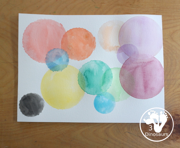 Circle Watercolor Painting with Cookie Cutters - a is great shape painting you can do with kids. You can use different sizes of cookie cutters for it and paint inside the cookie cutter to get the shape. - 3Dinosaurs.com