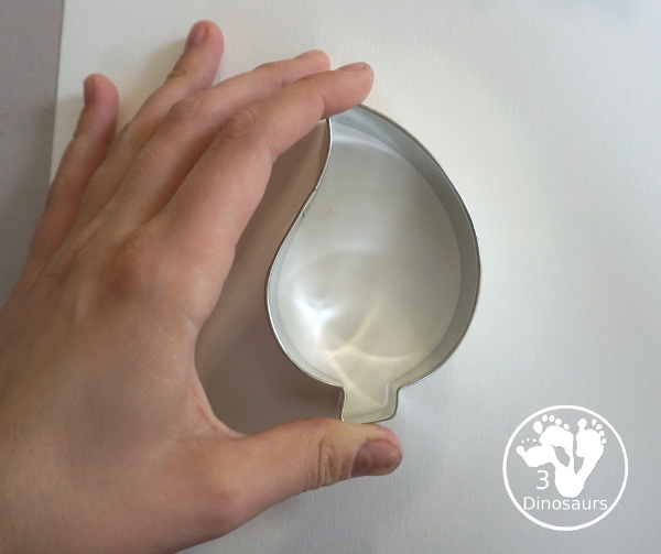 Leaves Cookie Cutter Painting - a fun fall painting wiht leaves. You can use a mix of red, yellow, orange and brown colors with this watercolor painting - 3Dinosaurs.com