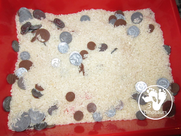 Pirate Sensory Bin - a sensory bin fill with pirate themes and coins for kids. Great for talk like a pirate day or a pirate theme- 3Dinosaurs.com
